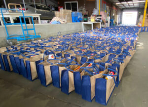 Various packed gift bags ready to donate