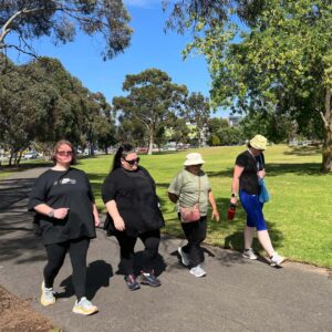 Four women walking in the park